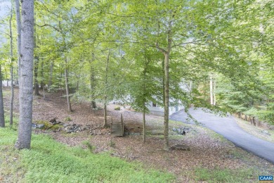 Custom built contemporary, first time on the market. This home on Lake Monticello Golf Course in Virginia - for sale on GolfHomes.com, golf home, golf lot