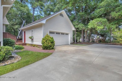 Discover Coastal Charm in Caswell Beach's Arboretum! Welcome to on Oak Island Golf Club in North Carolina - for sale on GolfHomes.com, golf home, golf lot