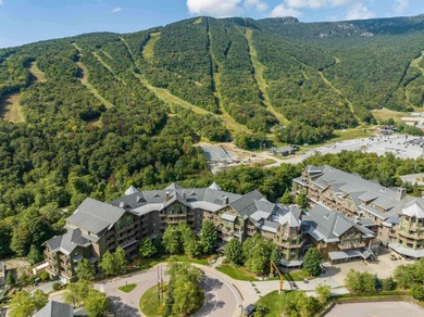 Discover The Lodge at Spruce Peak, the crown jewel of the Alpine on Stowe Mountain Club in Vermont - for sale on GolfHomes.com, golf home, golf lot