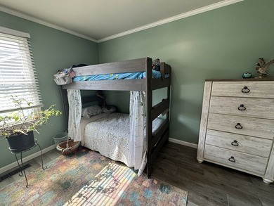 Large home located on an oversized lot in Captain's Cove on Captains Cove Golf and Yacht Club in Virginia - for sale on GolfHomes.com, golf home, golf lot