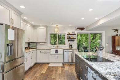 Experience mountain living at its finest in this stunning 4BR/2 on Connestee Falls Golf Club in North Carolina - for sale on GolfHomes.com, golf home, golf lot