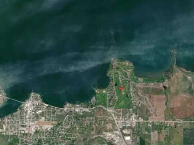 Located in the stunning Mission Bay community, lot 46 offers a on Polson Bay Golf Course - Championship Course in Montana - for sale on GolfHomes.com, golf home, golf lot