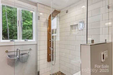 Experience mountain living at its finest in this stunning 4BR/2 on Connestee Falls Golf Club in North Carolina - for sale on GolfHomes.com, golf home, golf lot