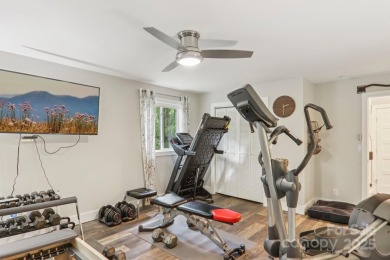 Experience mountain living at its finest in this stunning 4BR/2 on Connestee Falls Golf Club in North Carolina - for sale on GolfHomes.com, golf home, golf lot