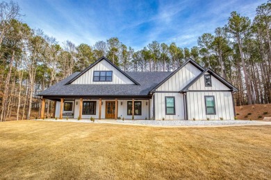 This exquisite custom built home offers 4 spacious bedrooms and on Harbor Club Golf and Country Club in Georgia - for sale on GolfHomes.com, golf home, golf lot