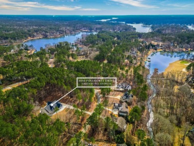 This exquisite custom built home offers 4 spacious bedrooms and on Harbor Club Golf and Country Club in Georgia - for sale on GolfHomes.com, golf home, golf lot