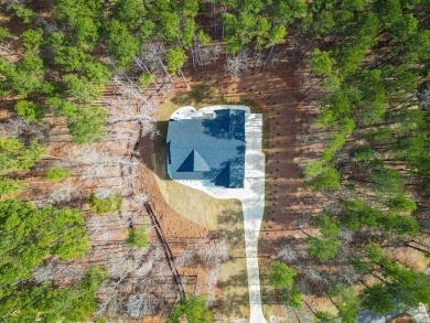 This exquisite custom built home offers 4 spacious bedrooms and on Harbor Club Golf and Country Club in Georgia - for sale on GolfHomes.com, golf home, golf lot