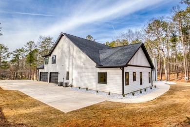 This exquisite custom built home offers 4 spacious bedrooms and on Harbor Club Golf and Country Club in Georgia - for sale on GolfHomes.com, golf home, golf lot