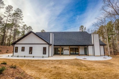 This exquisite custom built home offers 4 spacious bedrooms and on Harbor Club Golf and Country Club in Georgia - for sale on GolfHomes.com, golf home, golf lot