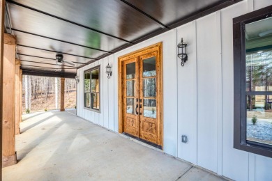 This exquisite custom built home offers 4 spacious bedrooms and on Harbor Club Golf and Country Club in Georgia - for sale on GolfHomes.com, golf home, golf lot