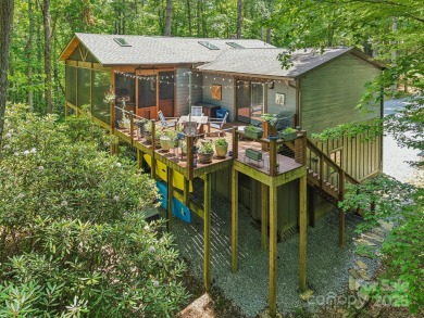 Experience mountain living at its finest in this stunning 4BR/2 on Connestee Falls Golf Club in North Carolina - for sale on GolfHomes.com, golf home, golf lot