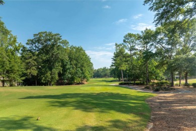 Nestled on the tee boxes of the #5 Signature Hole of the Jack on Great Waters Course At Reynolds Plantation in Georgia - for sale on GolfHomes.com, golf home, golf lot