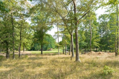 Nestled on the tee boxes of the #5 Signature Hole of the Jack on Great Waters Course At Reynolds Plantation in Georgia - for sale on GolfHomes.com, golf home, golf lot