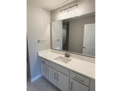 Welcome to this stunning 3-bedroom, 2-bath home located in the on Sherman Hills Golf Club in Florida - for sale on GolfHomes.com, golf home, golf lot