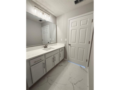 Welcome to this stunning 3-bedroom, 2-bath home located in the on Sherman Hills Golf Club in Florida - for sale on GolfHomes.com, golf home, golf lot