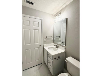 Welcome to this stunning 3-bedroom, 2-bath home located in the on Sherman Hills Golf Club in Florida - for sale on GolfHomes.com, golf home, golf lot