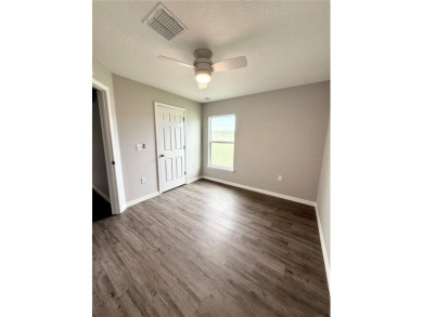 Welcome to this stunning 3-bedroom, 2-bath home located in the on Sherman Hills Golf Club in Florida - for sale on GolfHomes.com, golf home, golf lot