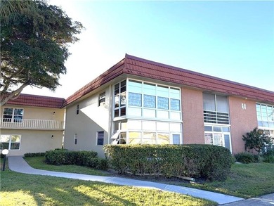 Beautiful * First Floor * Water View * * B * Plan * Two Bedroom on The American Golf Club in Florida - for sale on GolfHomes.com, golf home, golf lot