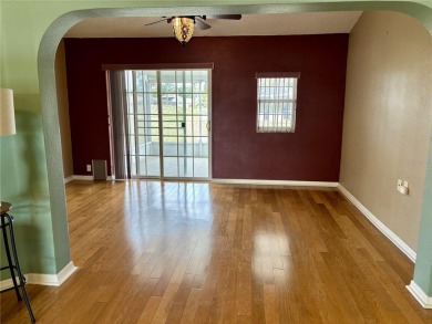 Welcome to a lovely home situated on a large corner lot in the on Caloosa Greens Executive Golf Course in Florida - for sale on GolfHomes.com, golf home, golf lot