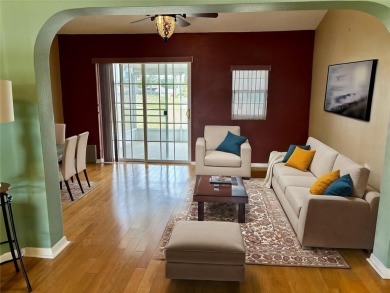 Welcome to a lovely home situated on a large corner lot in the on Caloosa Greens Executive Golf Course in Florida - for sale on GolfHomes.com, golf home, golf lot