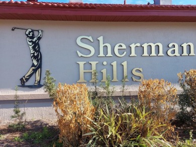 Welcome to this stunning 3-bedroom, 2-bath home located in the on Sherman Hills Golf Club in Florida - for sale on GolfHomes.com, golf home, golf lot