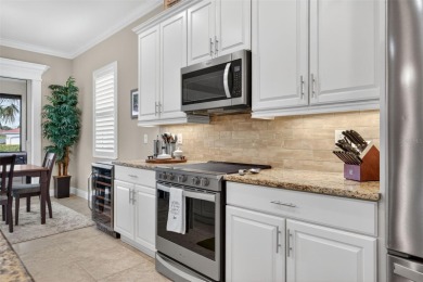 This isn't your average WCI Florencia model and it's priced to on Venetian Golf and River Club in Florida - for sale on GolfHomes.com, golf home, golf lot