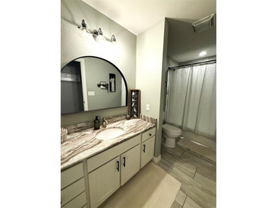 Step into a place where comfort meets possibility. This very on Hide-A-Way Lake Golf Course in Texas - for sale on GolfHomes.com, golf home, golf lot