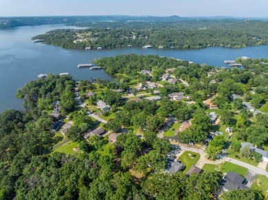 Calling all Chip & Joanna wannabes & weekend warriors!Tucked in on Kimberling City Golf Club in Missouri - for sale on GolfHomes.com, golf home, golf lot