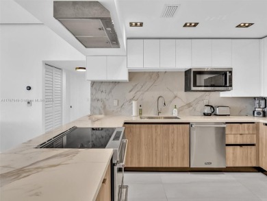 Step into unparalleled elegance with this exquisitely remodeled on Turnberry Isle Resort and Club in Florida - for sale on GolfHomes.com, golf home, golf lot