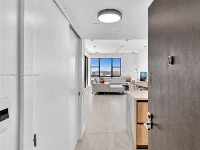 Step into unparalleled elegance with this exquisitely remodeled on Turnberry Isle Resort and Club in Florida - for sale on GolfHomes.com, golf home, golf lot