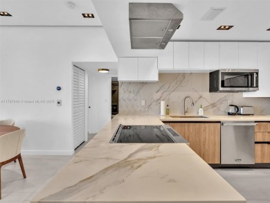 Step into unparalleled elegance with this exquisitely remodeled on Turnberry Isle Resort and Club in Florida - for sale on GolfHomes.com, golf home, golf lot