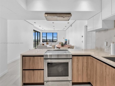 Step into unparalleled elegance with this exquisitely remodeled on Turnberry Isle Resort and Club in Florida - for sale on GolfHomes.com, golf home, golf lot