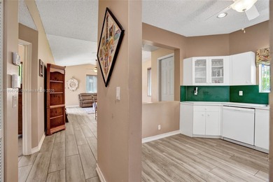 Beautiful 3-bedroom, 2-bath corner home located in the highly on Grand Palms Hotel and Golf Resort in Florida - for sale on GolfHomes.com, golf home, golf lot