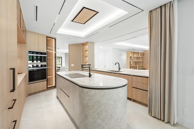 Experience refined luxury in this true designer Smart Home on Pine Tree Golf Club in Florida - for sale on GolfHomes.com, golf home, golf lot