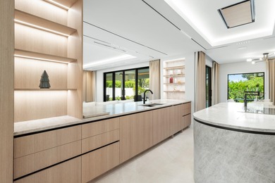 Experience refined luxury in this true designer Smart Home on Pine Tree Golf Club in Florida - for sale on GolfHomes.com, golf home, golf lot