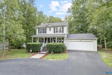 Spacious 3 bedroom colonial is filled with special features and on Lake Monticello Golf Course in Virginia - for sale on GolfHomes.com, golf home, golf lot