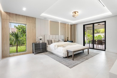 Experience refined luxury in this true designer Smart Home on Pine Tree Golf Club in Florida - for sale on GolfHomes.com, golf home, golf lot