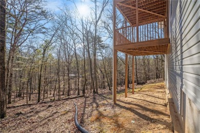 This Ranch style house on a full unfinished basement is ready on The Highlands Course at Lake Arrowhead in Georgia - for sale on GolfHomes.com, golf home, golf lot