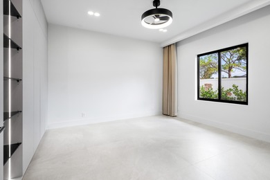 Experience refined luxury in this true designer Smart Home on Pine Tree Golf Club in Florida - for sale on GolfHomes.com, golf home, golf lot