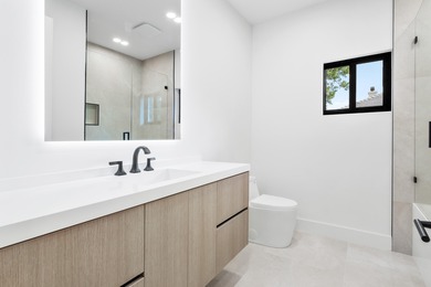 Experience refined luxury in this true designer Smart Home on Pine Tree Golf Club in Florida - for sale on GolfHomes.com, golf home, golf lot