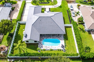 Experience refined luxury in this true designer Smart Home on Pine Tree Golf Club in Florida - for sale on GolfHomes.com, golf home, golf lot