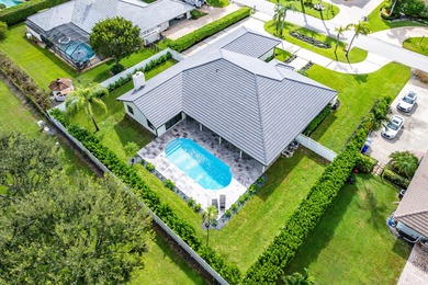 Experience refined luxury in this true designer Smart Home on Pine Tree Golf Club in Florida - for sale on GolfHomes.com, golf home, golf lot