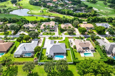 Experience refined luxury in this true designer Smart Home on Pine Tree Golf Club in Florida - for sale on GolfHomes.com, golf home, golf lot