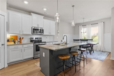 Welcome to this charming home in the highly sought-after on Traditions of Braselton Golf Club in Georgia - for sale on GolfHomes.com, golf home, golf lot