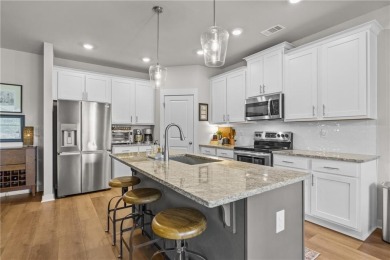 Welcome to this charming home in the highly sought-after on Traditions of Braselton Golf Club in Georgia - for sale on GolfHomes.com, golf home, golf lot