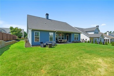 Welcome to this charming home in the highly sought-after on Traditions of Braselton Golf Club in Georgia - for sale on GolfHomes.com, golf home, golf lot