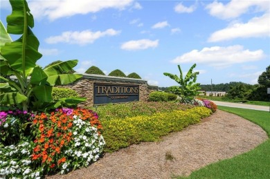 Welcome to this charming home in the highly sought-after on Traditions of Braselton Golf Club in Georgia - for sale on GolfHomes.com, golf home, golf lot