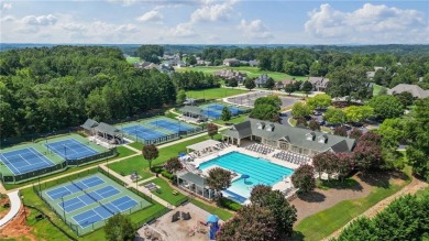 Welcome to this charming home in the highly sought-after on Traditions of Braselton Golf Club in Georgia - for sale on GolfHomes.com, golf home, golf lot