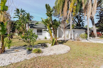 Short Sale. Step into this stunning split-floor plan residence on Tarpon Springs Golf Course in Florida - for sale on GolfHomes.com, golf home, golf lot