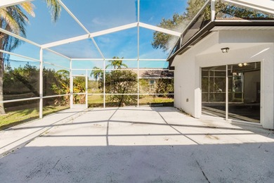 Short Sale. Step into this stunning split-floor plan residence on Tarpon Springs Golf Course in Florida - for sale on GolfHomes.com, golf home, golf lot
